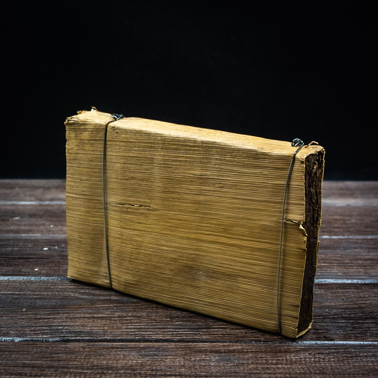 Шу Пуэр в пальмовых листьях 250 грамм 2009 год, Картинка